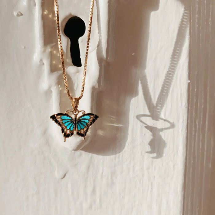 14K SMALL AQUA BLUE ENAMELED WINGS BUTTERFLY CHARM