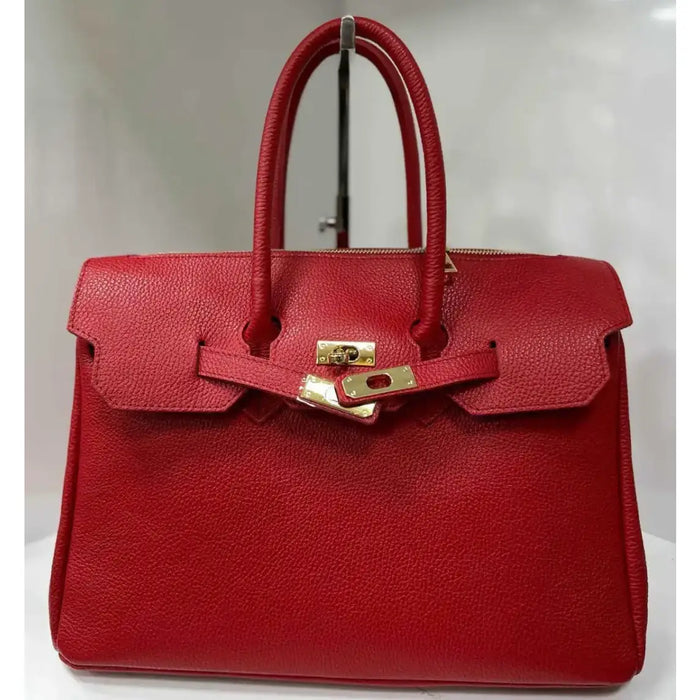 NEW! SFR LEATHER RED HANDBAG STRUCTURED DESIGN AND LOCK CLOSURE
